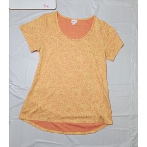 Womens Lularoe short sleeve shirt.  Orange with bear‎ design.  Size Large.